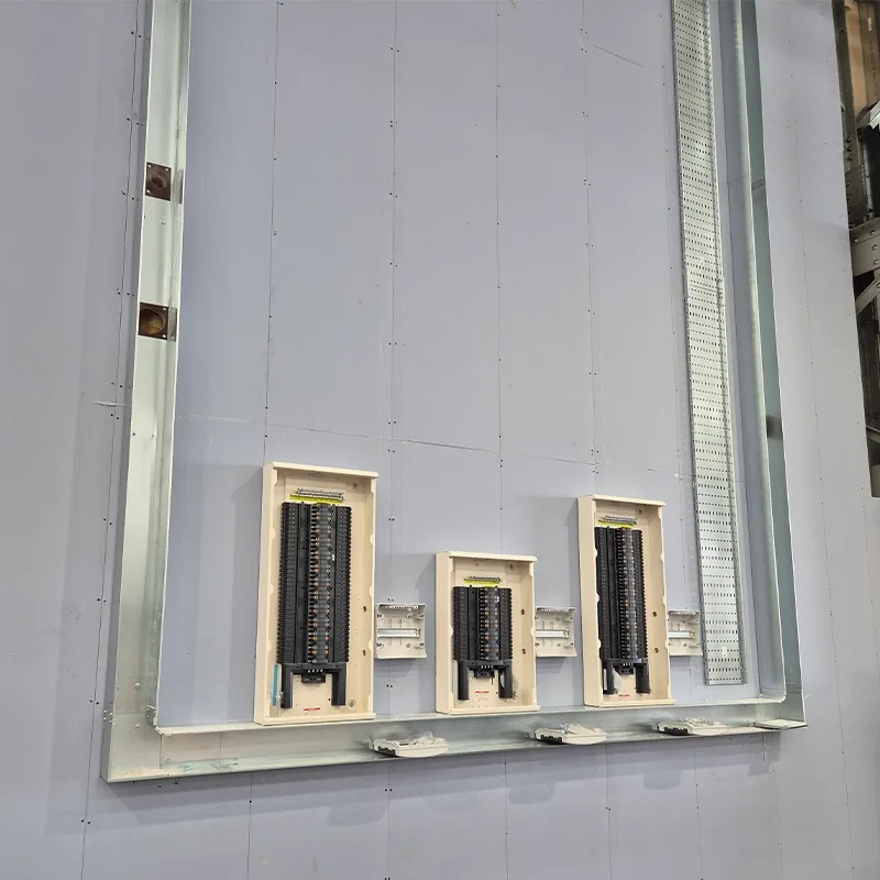 Panel board chassis installed into a distribution cabinet